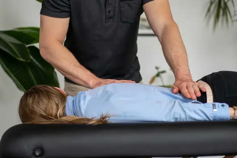 A women having a back chiropractic