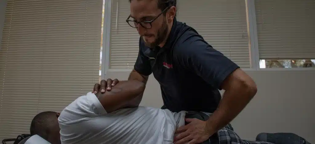 Dr. Stumpff conducting chiropractic treatment