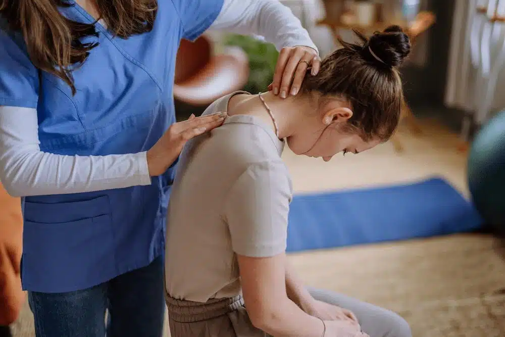 Patient having some Scoliosis treatment in a chiropractic clinic