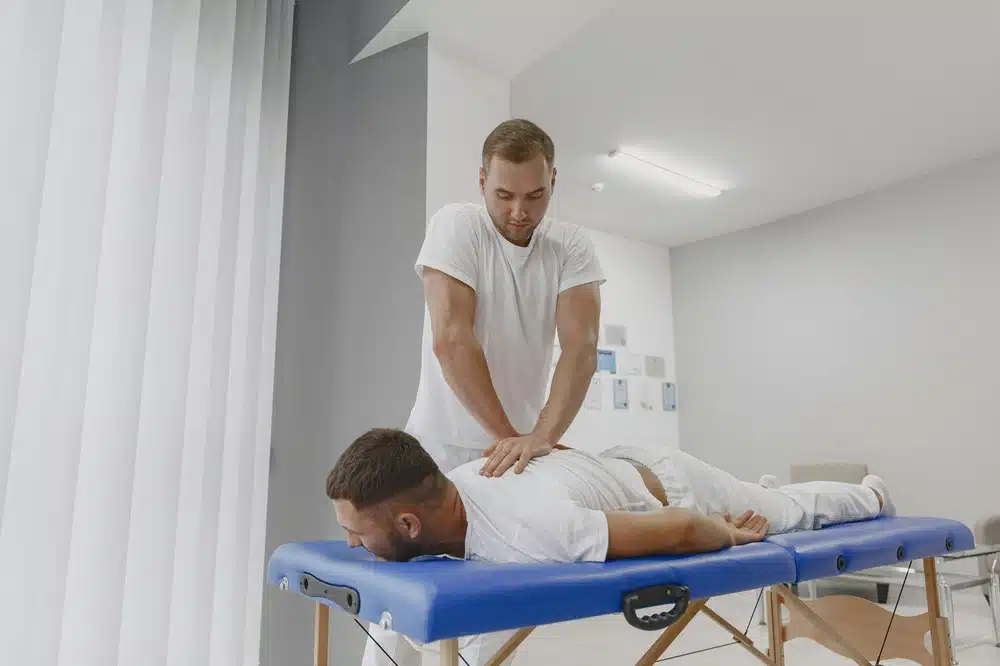 Chiropractor treating a patient